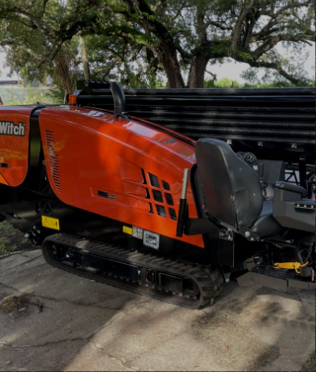 Orange Ditch Witch directional drill on its tracks